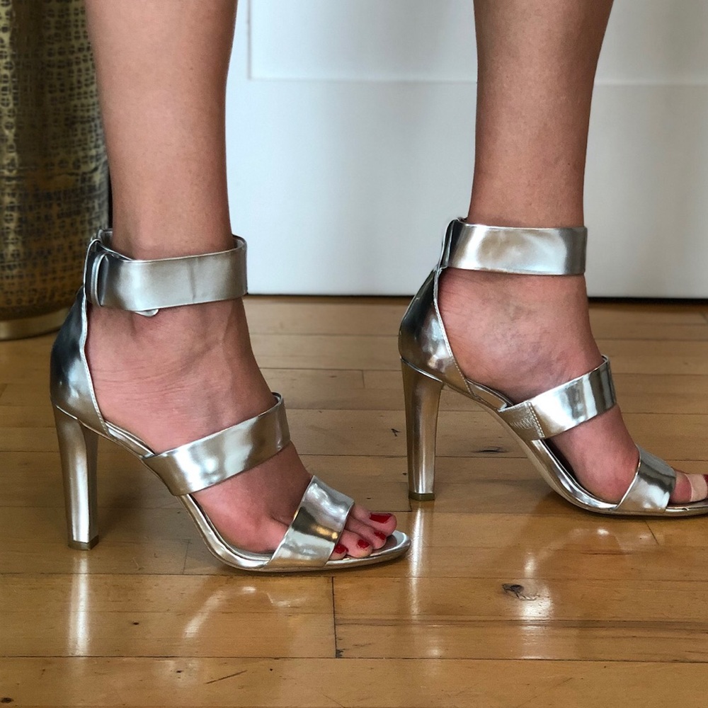 Calvin Klein silver pumps